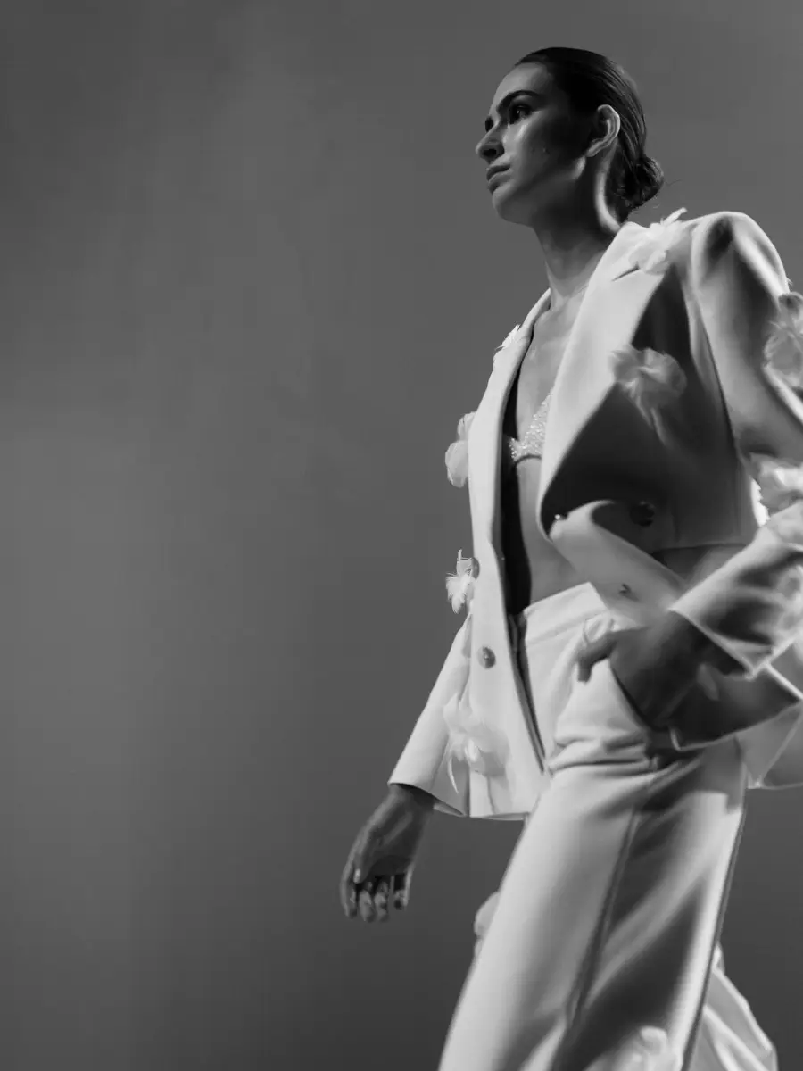 Model in an ivory suit